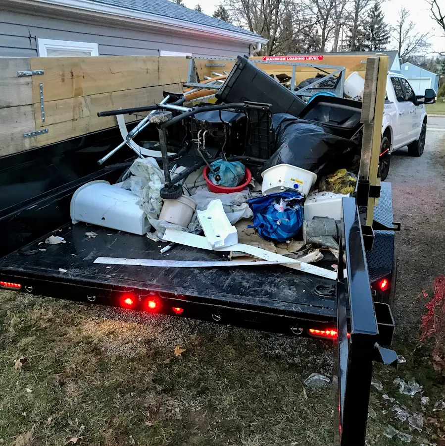 Roll-off dumpster delivered to a residential driveway in Lee Acres